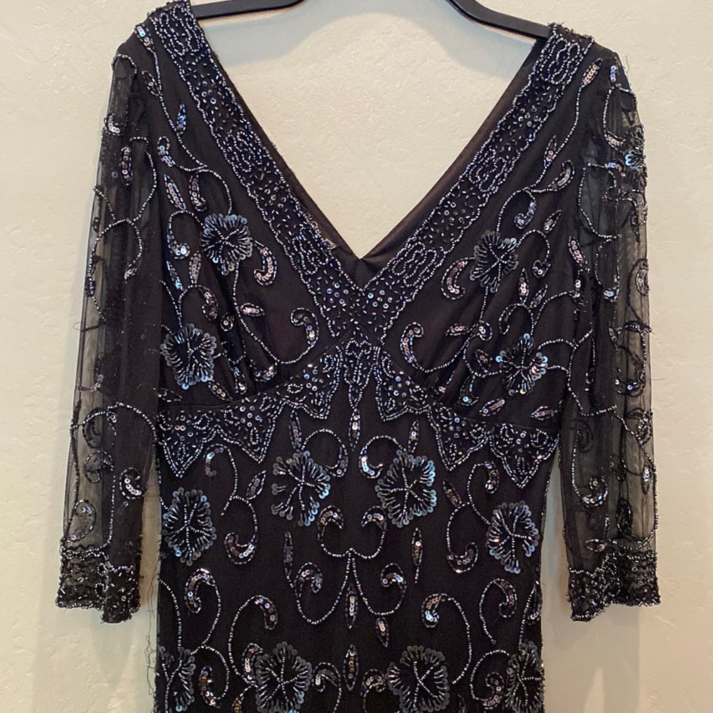 Maxi length. Beaded. 3/4 length sleeves